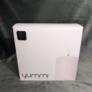 NWT Yummi 3x8 Black Pillar Candles 3 pack 80 hours. Clean Burning. MSRP $38